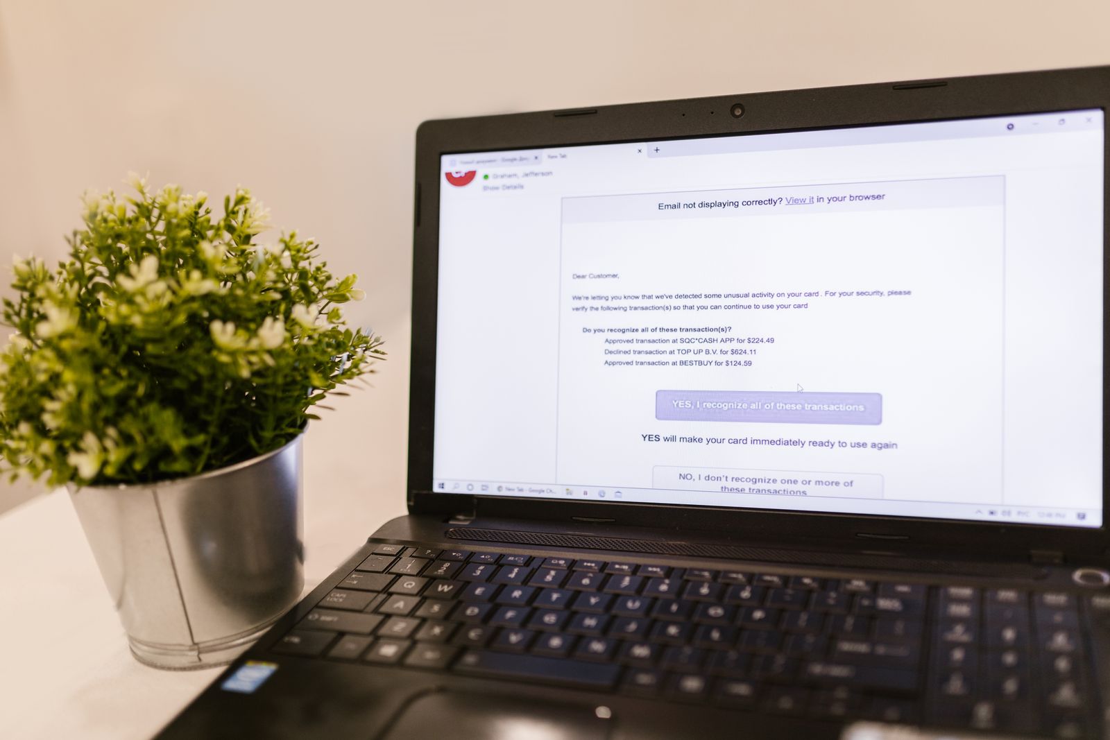 Laptop showing an email newsletter being composed
